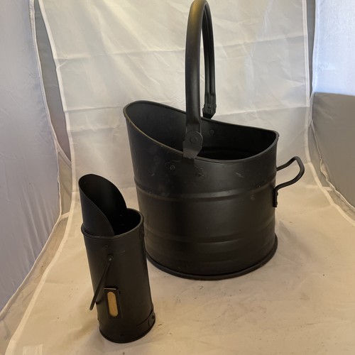 Black metal coal bucket and - coal,